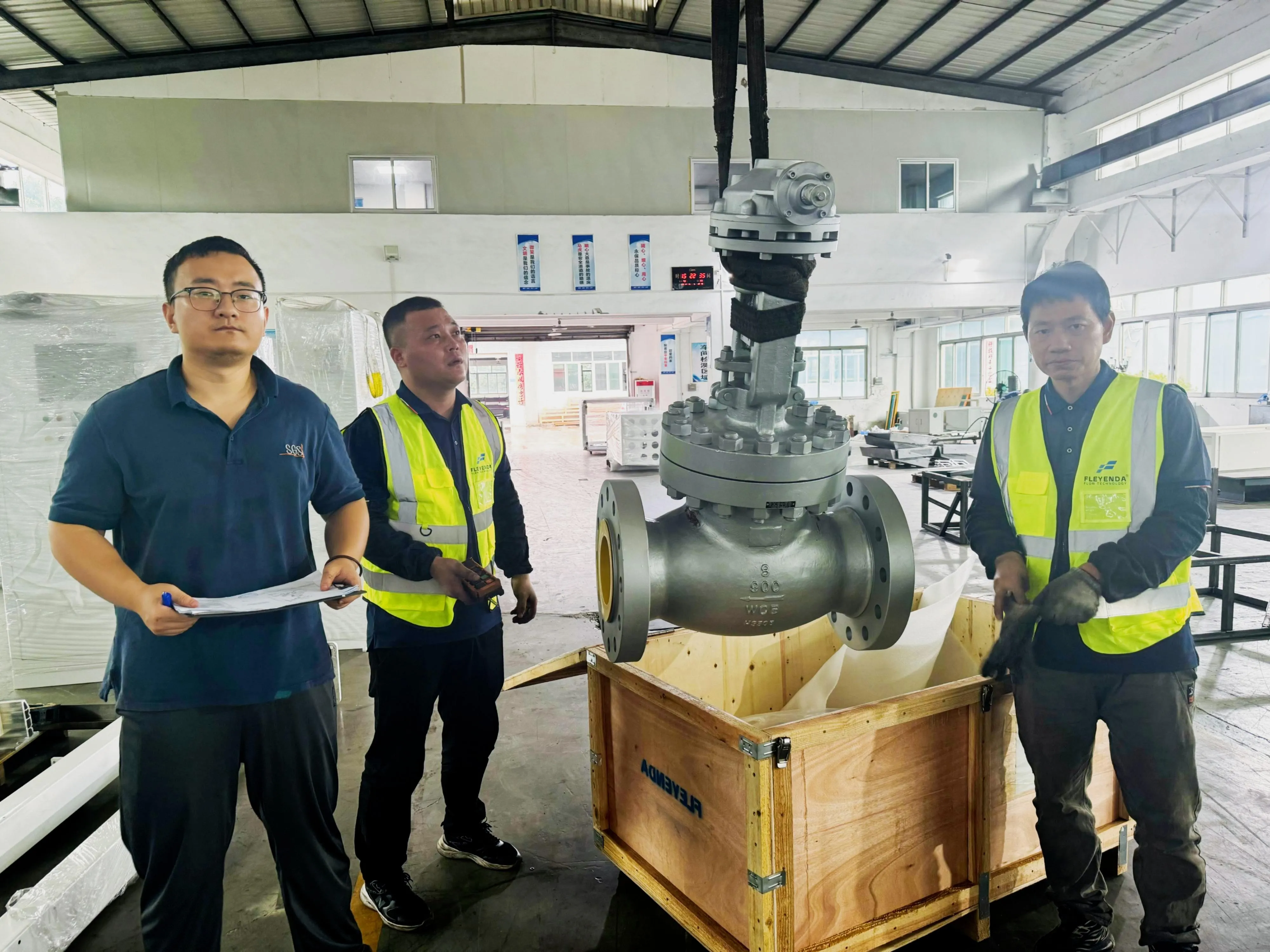 Technician inspecting stainless steel filtration and process equipment